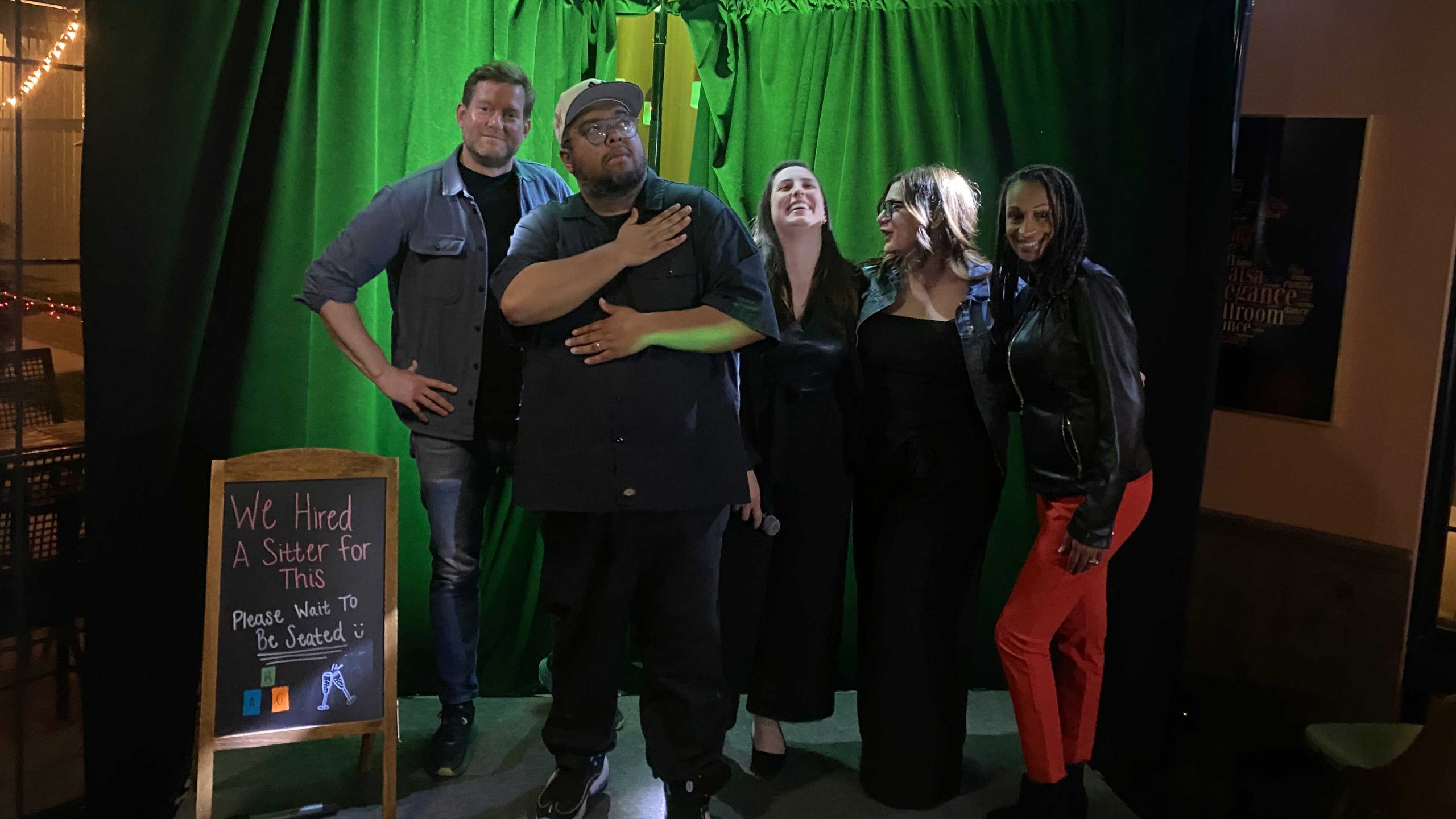 comedians taking a picture with a group of friends at HPAC